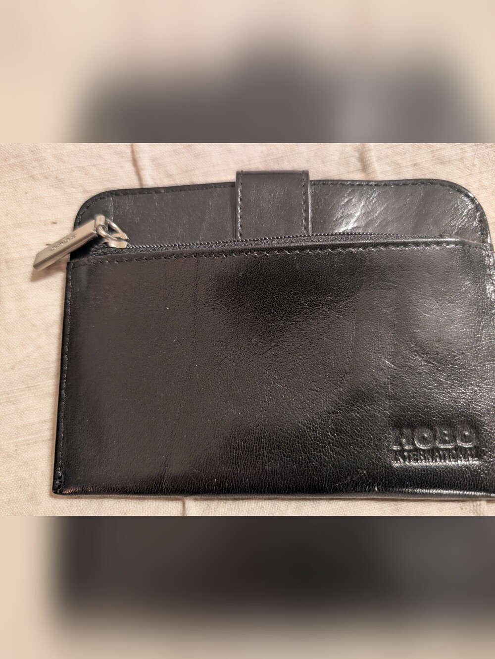 HOBO Black Leather Zip Wallet with Tab Closure